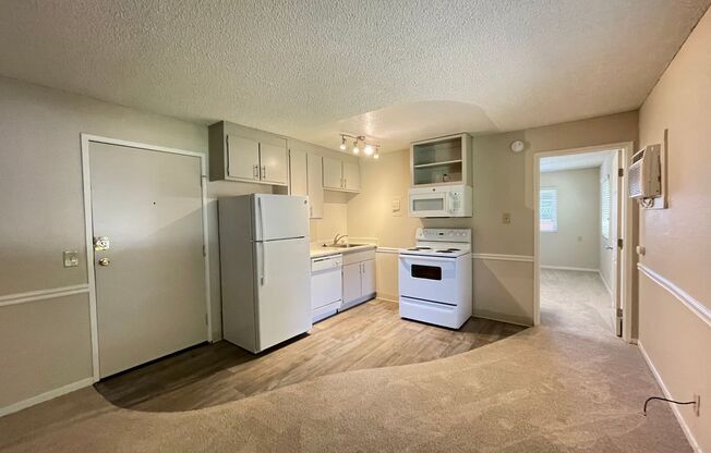 Includes Free Covered and Gated Parking Space!  $1,000 Moves You in Today!