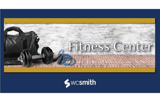 the fitness center logo with a bag on the ground