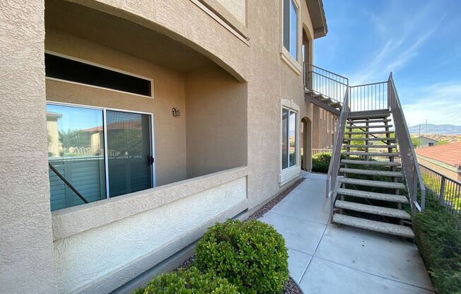 BEAUTIFUL CONDO IN A GATED COMMUNITY FEATURING PLANTATION SHUTTERS, TILE FLOORING AND NEW PAINT THROUGHOUT!