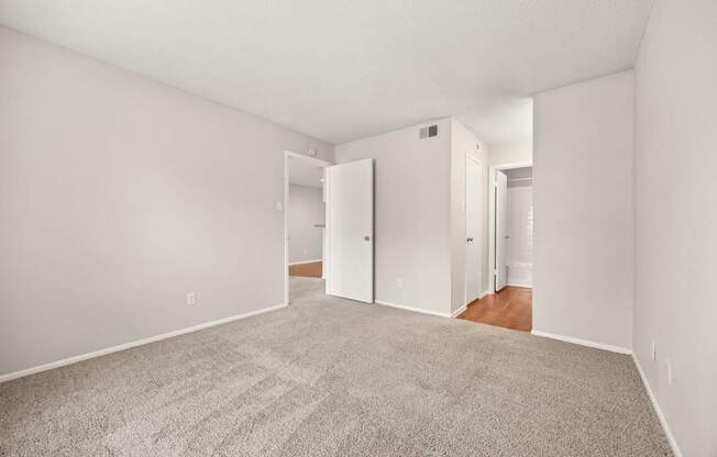 A room with a carpeted floor and white walls. at Montecito, Austin, TX, 78741