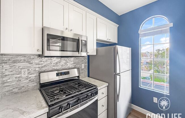 Single-Level Mira Mesa Condo with Balcony, AC & Garage Parking