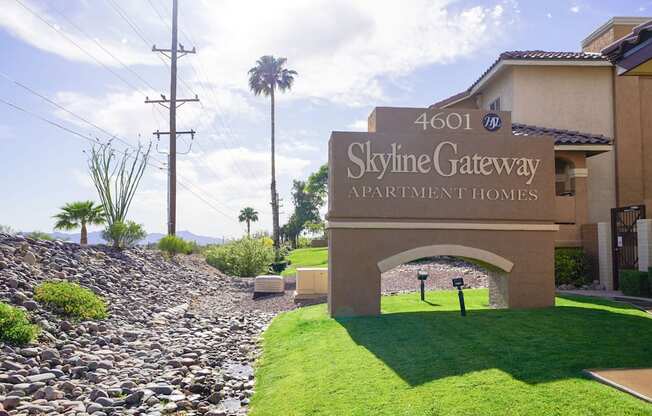 The image shows the entrance to the Skyline Gateway Apartment Homes.
