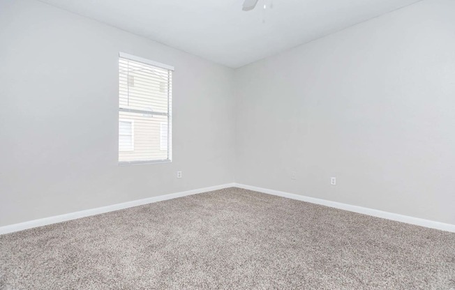 Unfurnished room with wooden tiles at Royal Wildewood Manor Apartments, Texas, 77531