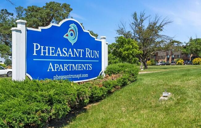 welcome sign at Pheasant Run Apartments