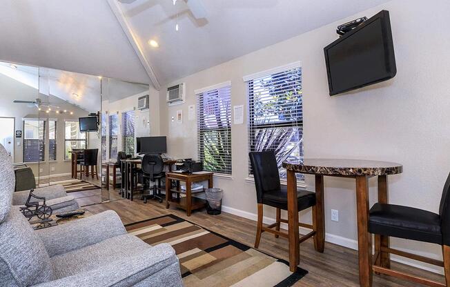 a living room filled with furniture and a fireplace