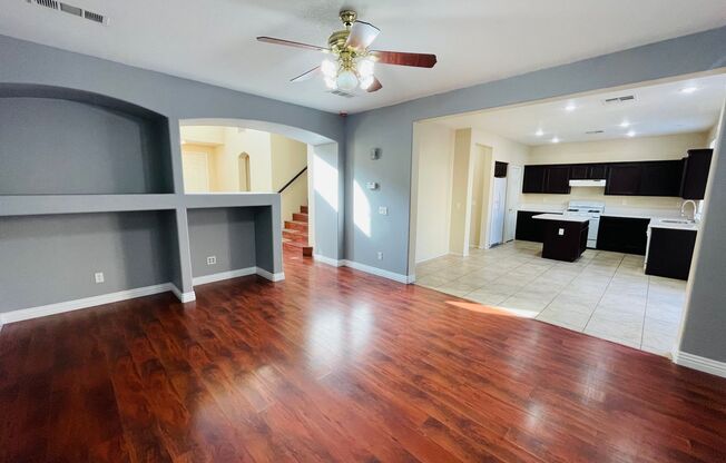 Large 5 bedroom family home right off of Blue Diamond, in gated community, with a full bedroom and bathroom downstairs!