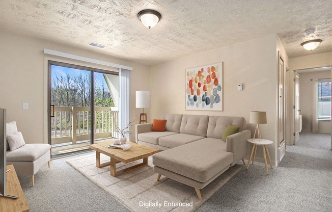 A living room with a couch and plush carpeting at Irish Hills Apartments, South Bend, 46614