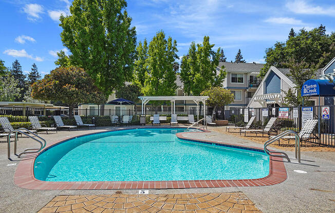 Sunny poolside view at Clayton Creek Apartments, Concord, 94521