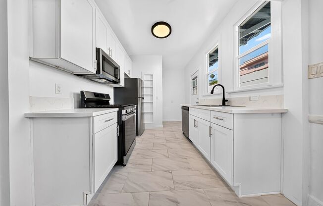 1002-1012 1/2 N. Sweetzer Ave.