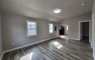 MOVE IN SPECIAL! Beautifully renovated East side home with 2+ car detached garage!