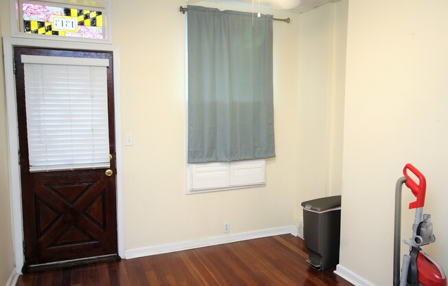 Charming Locust Point 2bd+Den/1ba Rowhome w/ W/D, CAC and One-Car garage! Available 7/15!