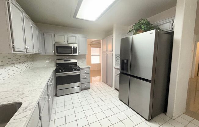 Spacious 4-Bedroom Home with 3-Car Garage in Orchards of Las Vegas