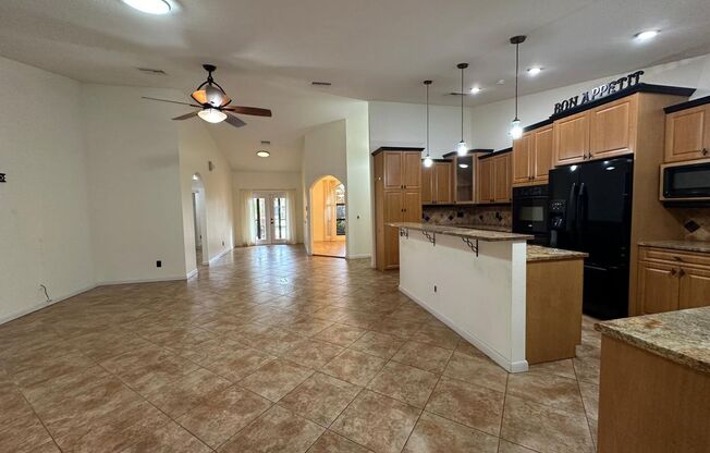 Tranquil Lakefront Living in the Heart of Port St. Lucie with Pool!