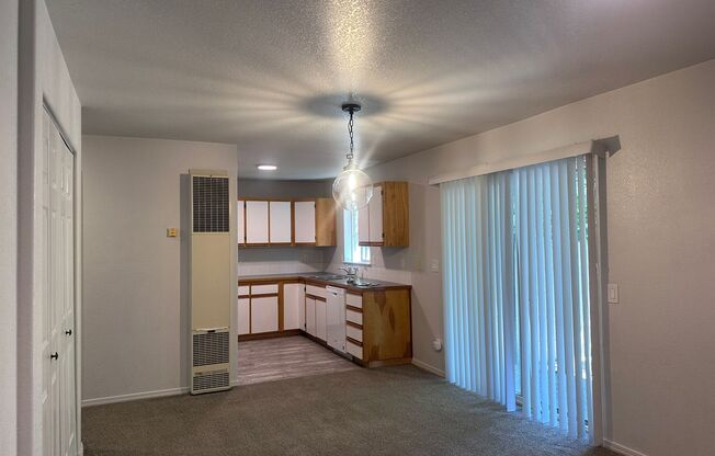Updated Westside downstairs apartment in the Forest Condominiums just off Newport!