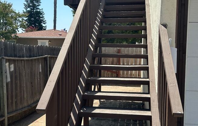 Upstairs 1 bedroom 1 bath unit with a one car garage included.