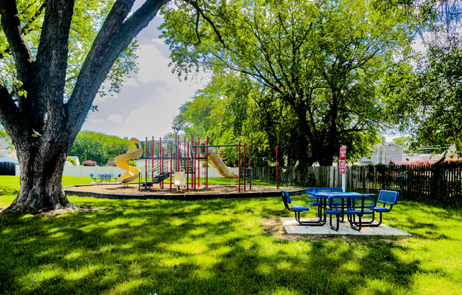 a park with a playground and a picnic table at Glen Hollow, Pennsylvania