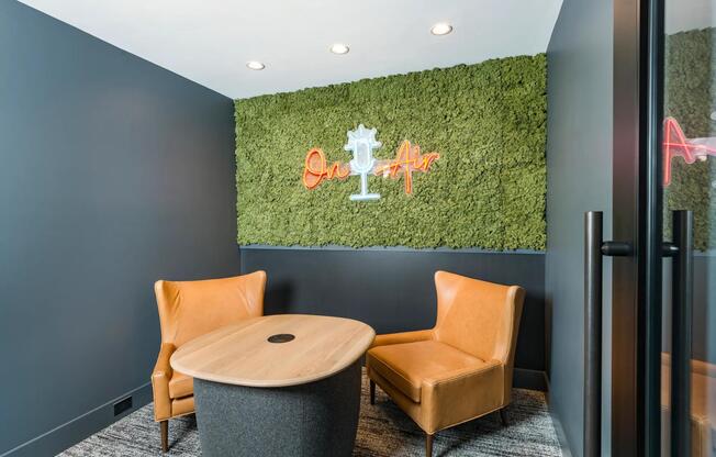 A polished podcast room perfect for content creation, client calls, or your next big idea—just press record and let inspiration flow.