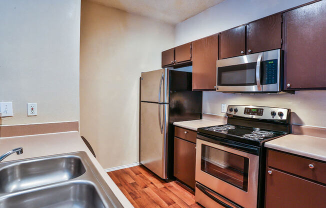 Upgraded kitchen with new appliances at Best apartments in Irving TX