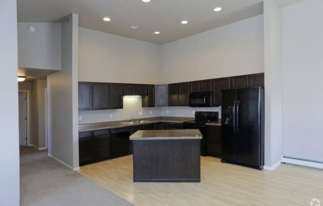 Kitchen with cabinets and appliances at Stonebridge Villas Apartments, Minot, 58703