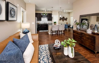 a living room with a couch and a table