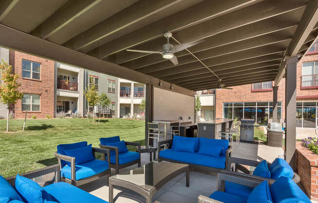 Westlake Greens Outdoor Kitchen and blue seating area