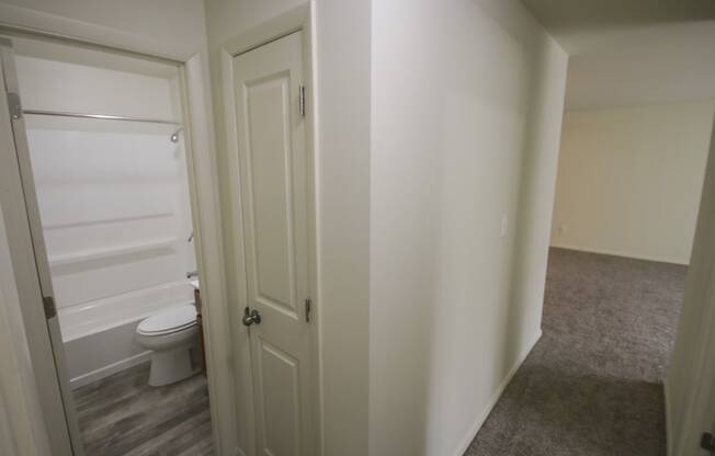 This is a photo of the hallway showing the closet in a 750 square foot 2 bedroom, 1 bath apartment at Park Lane Apartments in Cincinnati, OH.