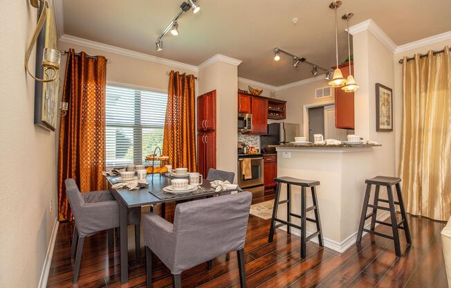 a living room filled with furniture and a large window