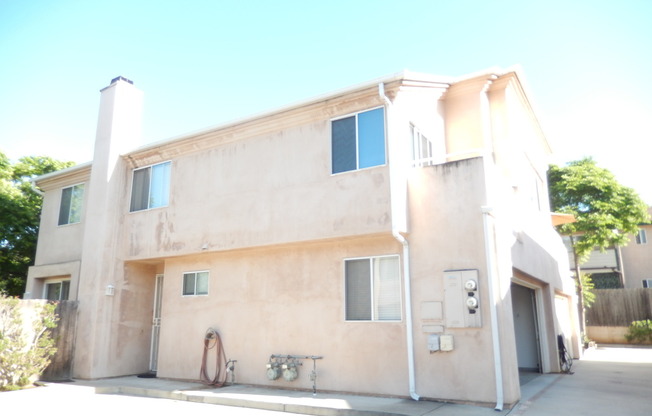 Updated Two Story Townhome w/ Two Car Garage