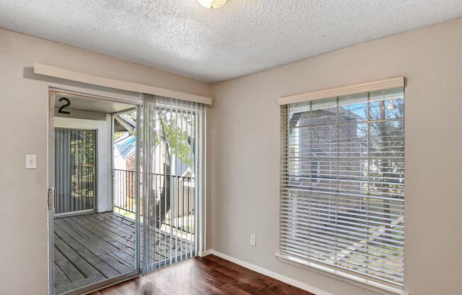 a room filled with furniture and a large window