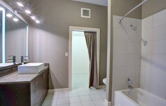 Upscale apartment Bathroom with Garden tub and shower and spacious walk in closet at The Mosaic on Broadway, San Antonio, 78215