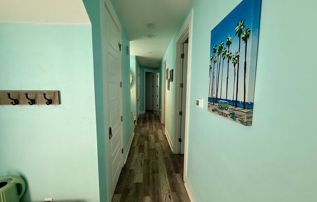 4 Bed 3 Bath Fully Furnished Modern Home with 2 Car Garage just 2 Blocks from the Beach! Pet Friendly with Fenced in Backyard, Second Floor Balcony & Fully Equipped Kitchen!