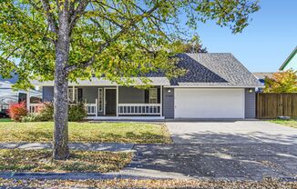 Charming 3-Bedroom Home in Hillsboro: Modern Amenities, Cozy Gas Fireplace, Spacious Kitchen, Fenced Yard & Energy Score of 6!