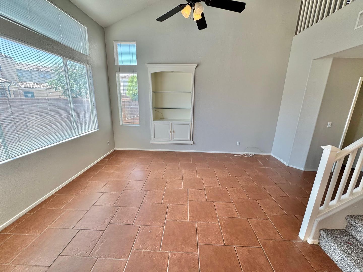 THIS IS A CHARMING TWO-STORY NORTH LAS VEGAS HOME WITH 2 BEDROOMS, 2.5 BATHS AND A TWO-CAR ATTACHED GARAGE. FEATURING TILE AND CARPET FLOORING, NEUTRAL PAINT, AND BLINDS THROUGHOUT, THE MAIN LEVEL OFFERS AN OPEN LIVING AND DINING AREA THAT FLOWS INTO A KI