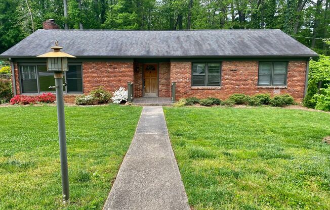 East AVL - Three Bedroom, 3 Bathroom Brick Ranch with bonus space!