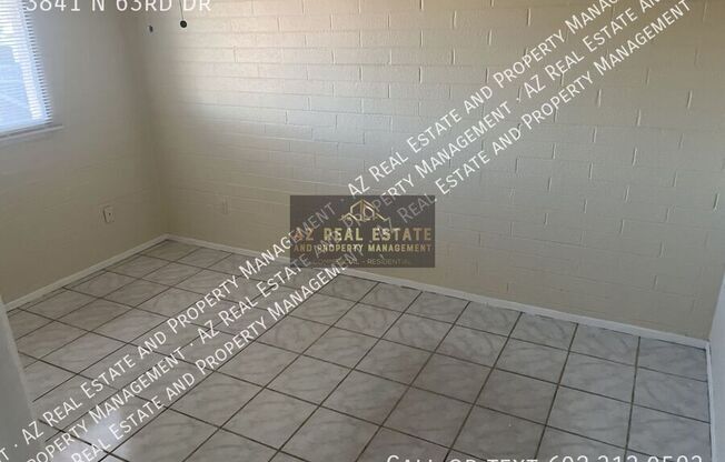 3841 N 63 DR