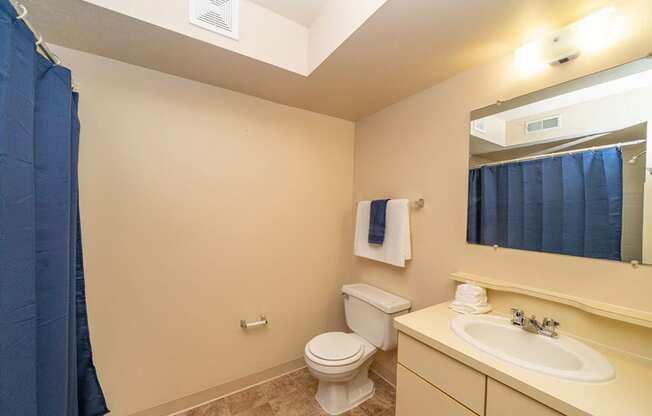 Western Toilet In Bathroom at North Pointe Apartments, Elkhart