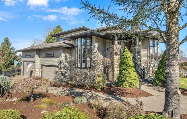 Stunning 5-Bedroom Bull Mountain Estate with Dual Living, Chef's Kitchen & 4-Car Garage