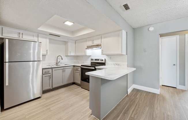 the preserve at ballantyne commons apartment kitchen with stainless steel appliances