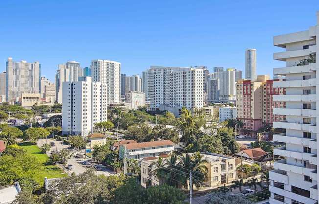 1- & 2-Bedroom Apartments for Rent in Miami, FL – Riverview One Apartments – A cityscape with a mix of modern and older buildings in Miami, FL