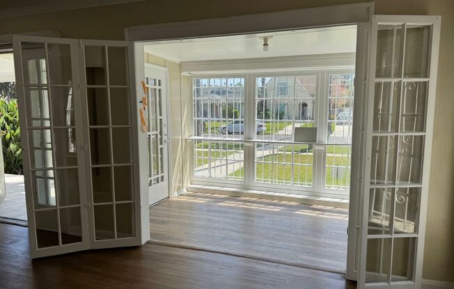A three-bedrooms, one-bathroom house at 4817 6th Ave. Los Angeles