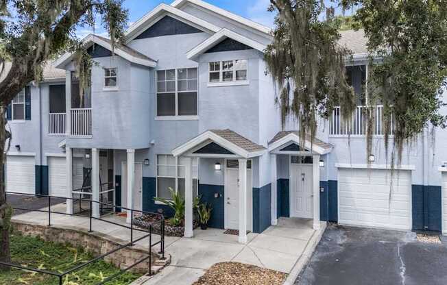 A row of houses with blue and white exteriors.
