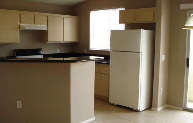 2 Bedroom Condo! All Tiled Living Area!