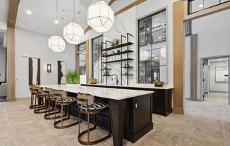 a large kitchen with a marble counter top and bar stools at Madison Prickett Preserve, Yardley, PA