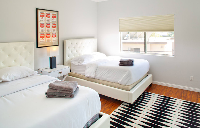 Apartment bedroom with wood flooring