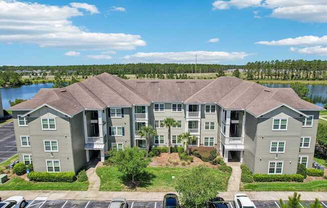 Front view of our apartment buildings in the daytime at Oakleaf Plantation apartments in Jacksonville, FL