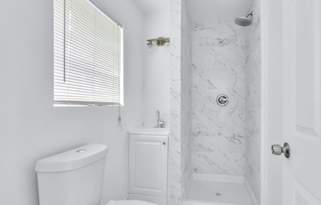 Cozy and well-maintained second-floor 1-bedroom, 1-bath unit in a quiet fourplex