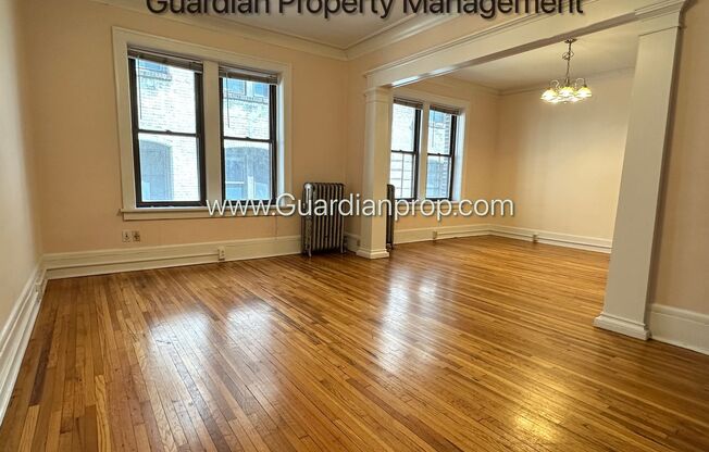 Spacious Lakes Uptown Apartment, Blocks from Both Lakes, Hardwood Floors, One Month Free