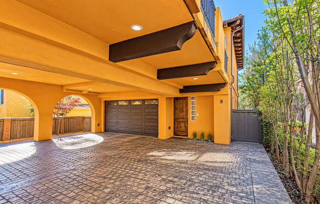 SPACIOUS & SECLUDED, SPANISH MEDITERRANEAN REAR UNIT TOWNHOUSE W/ LARGE ROOFTOP DECK W/ OCEAN/PV VIEWS, 2 BALCONIES, WRAP AROUND YARD & 2-CAR GARAGE ON CUL-DE-SAC STREET CLOSE TO SCHOOLS, SHOPPING, RB PIER & BEACH!