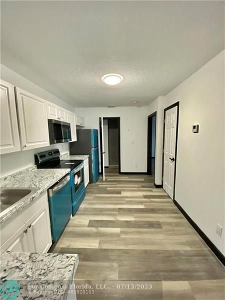 411 SE 10 ST
