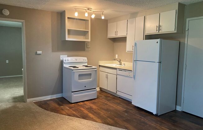 Includes Free Covered and Gated Parking Space!  $1,000 Moves You in Today!
